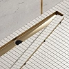 Душевой лоток Timo Drain System 900 с двусторонней панелью "plate" под плитку, Золото матовое Душевой лоток Timo Drain System 900 с двусторонней панелью "plate" под плитку, Золото матовое