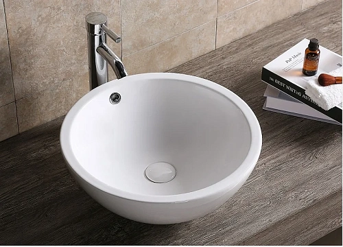 Раковина Ceruttispa CR1001 450х450х170 накладная, белая, круглая, с переливом Раковина Ceruttispa CR1001 450х450х170 накладная, белая, круглая, с переливом