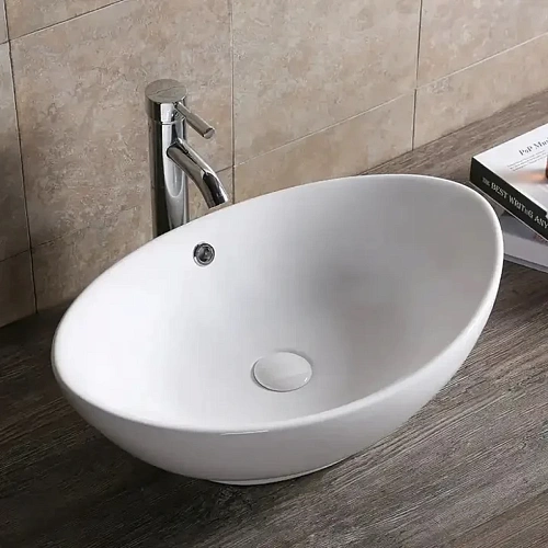 Раковина Ceruttispa CR7027 590х385х195 накладная, белая, лодочка, с переливом Раковина Ceruttispa CR7027 590х385х195 накладная, белая, лодочка, с переливом