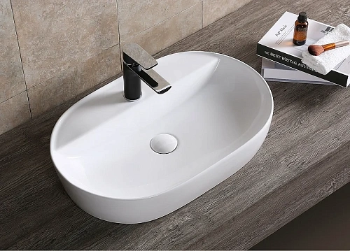 Раковина Ceruttispa CR0074 600х400х120 накладная, белая, овальная, с отверстием под смеситель Раковина Ceruttispa CR0074 600х400х120 накладная, белая, овальная, с отверстием под смеситель
