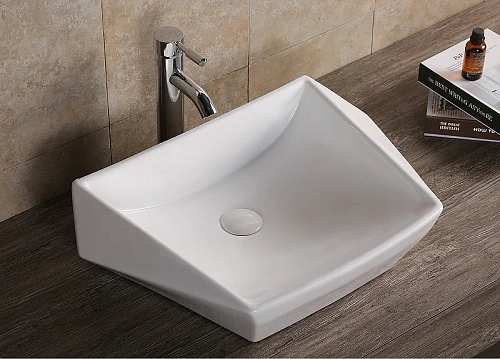 Раковина Ceruttispa CR7065 600х410х155 накладная, белая, асимметричная Раковина Ceruttispa CR7065 600х410х155 накладная, белая, асимметричная