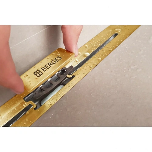 Душевой лоток BERGES SIMPEL 1000, золото глянец, S-сифон D50/105 H50 вертикальный 092013 Душевой лоток BERGES SIMPEL 1000, золото глянец, S-сифон D50/105 H50 вертикальный 092013