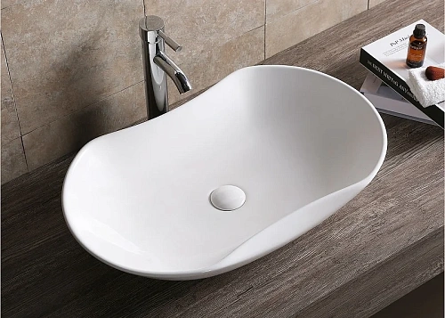 Раковина Ceruttispa CR7031 670х415х125 накладная, белая, усеченный овал Раковина Ceruttispa CR7031 670х415х125 накладная, белая, усеченный овал