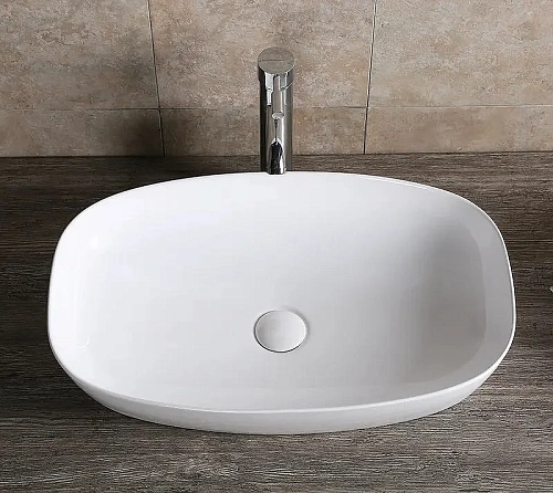 Раковина Ceruttispa CR0063 600х385х135 накладная, белая, прямоугольная Раковина Ceruttispa CR0063 600х385х135 накладная, белая, прямоугольная