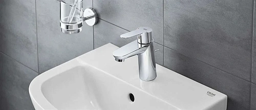Смеситель для раковины GROHE BauEdge 23759000 с энергосберегающей функцией Смеситель для раковины GROHE BauEdge 23759000 с энергосберегающей функцией