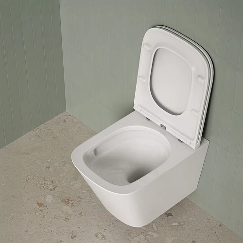 Унитаз подвесной IDDIS Bild Q (BIQRNSEi25) с сиденьем безободковый c системой смыва Торнадо Унитаз подвесной IDDIS Bild Q (BIQRNSEi25) с сиденьем безободковый c системой смыва Торнадо