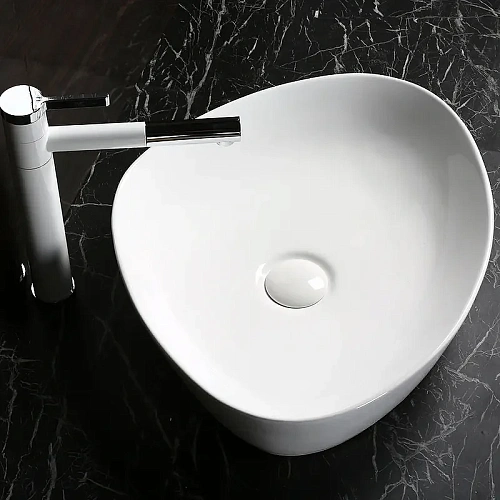 Раковина Ceruttispa CR0021C 500х400х160 накладная, белая, треугольная Раковина Ceruttispa CR0021C 500х400х160 накладная, белая, треугольная