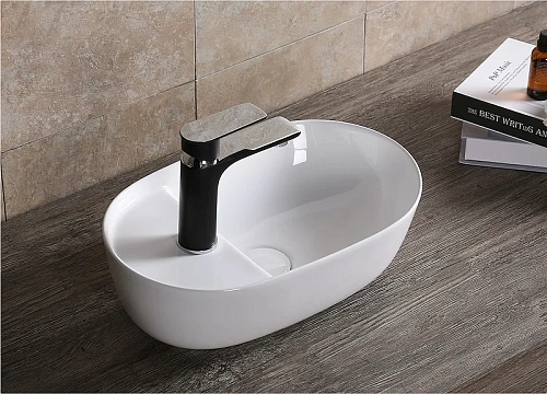 Раковина Ceruttispa CR0050 420х270х135 накладная, белая, овальная Раковина Ceruttispa CR0050 420х270х135 накладная, белая, овальная