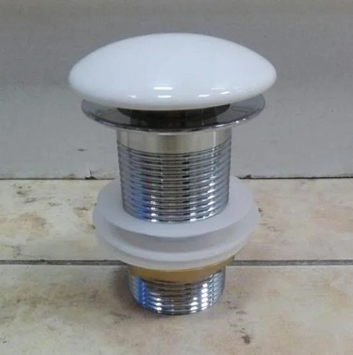 Донный клапан Vincea DBS-216, белая крышка, без перелива Донный клапан Vincea DBS-216, белая крышка, без перелива